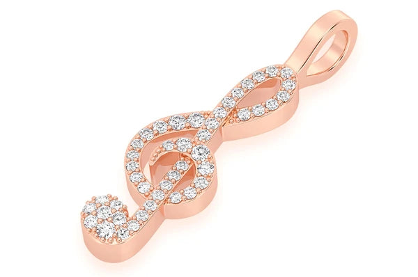 Pendentif diamant clé de sol 0,25 ct, or massif 14 carats