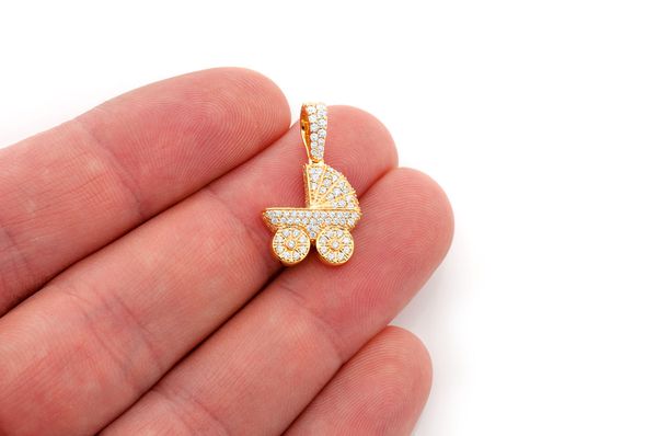 Pendentif poussette bébé 0,68 ct diamant or jaune 14 carats