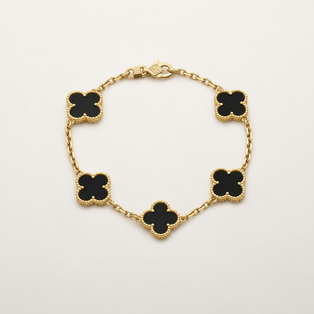 Van Cleef & Arpels Vintage Alhambra bracelet 5 motifs 18K yellow gold with black onyx clover charms — Erkals